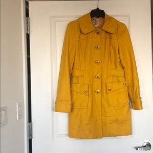 A gorgeous mustard yellow wool coat